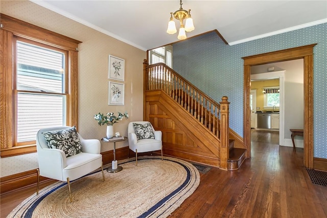190 Laburnam Cres, Rochester, NY 14620 - staircase featuring hardwood / wood-style floors, ornamental molding, a chandelier, and wallpapered walls