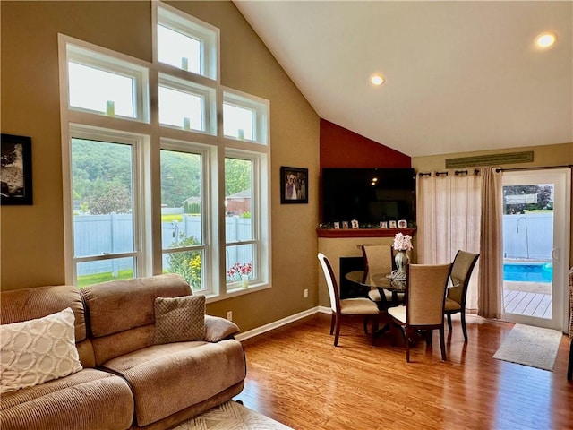 187 Seaward Ave, Bradford-City, PA 16701 - dining area with light wood finished floors, high vaulted ceiling, and recessed lighting