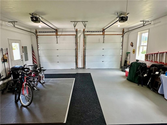 187 Seaward Ave, Bradford-City, PA 16701 - garage with electric panel and a garage door opener