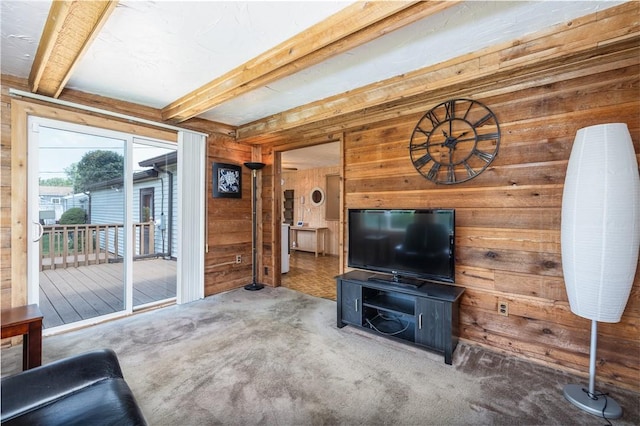 244 Wildflower Dr, Henrietta, NY 14623 - carpeted living area featuring wood walls and beam ceiling
