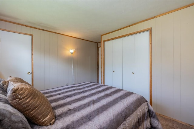 244 Wildflower Dr, Henrietta, NY 14623 - bedroom with ornamental molding, carpet, and a closet