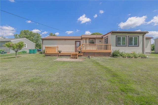 244 Wildflower Dr, Henrietta, NY 14623 - back of property featuring a wooden deck and a yard