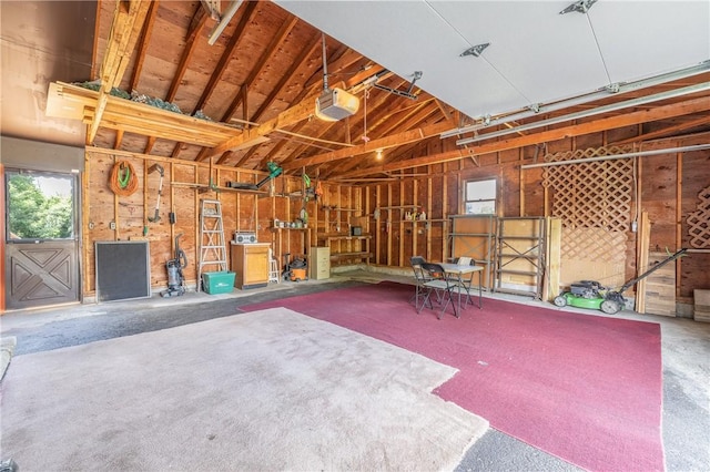 244 Wildflower Dr, Henrietta, NY 14623 - garage featuring a garage door opener