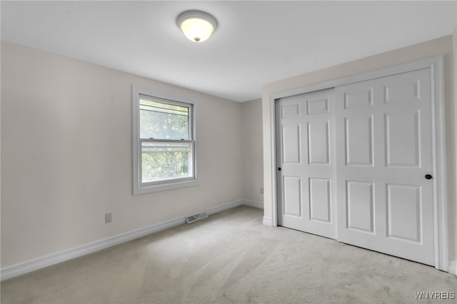 10 San Mateo Ct, Amherst, NY 14051 - unfurnished bedroom with carpet flooring and a closet