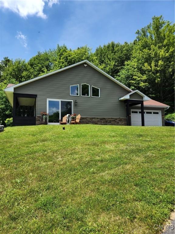 1683 Song Mountain Rd, Preble, NY 13141 - view of front of house featuring a front yard and a garage
