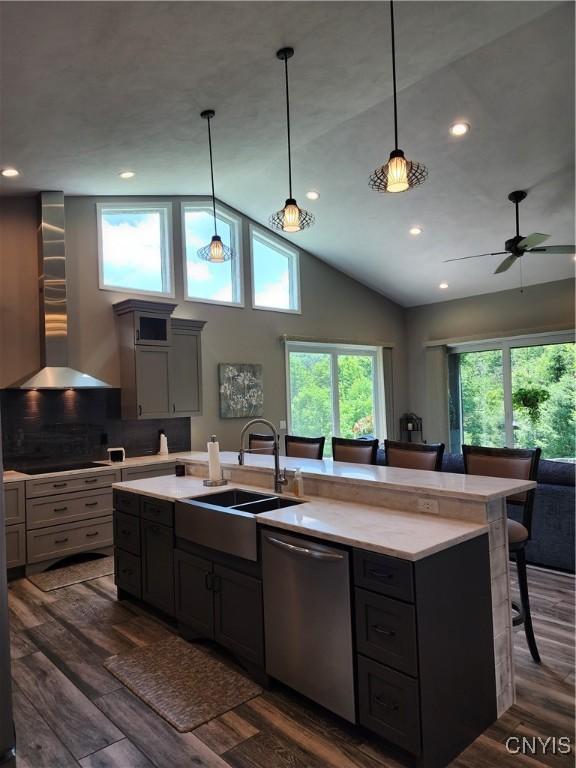 1683 Song Mountain Rd, Preble, NY 13141 - kitchen with dishwasher, wall chimney range hood, recessed lighting, lofted ceiling, and dark wood-style floors