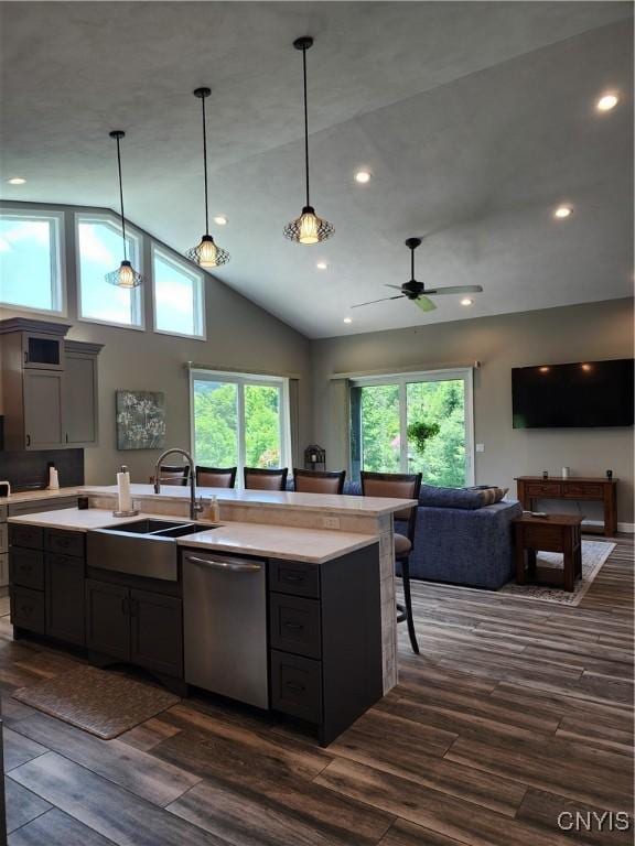 1683 Song Mountain Rd, Preble, NY 13141 - kitchen featuring dishwasher, vaulted ceiling, light countertops, ceiling fan, and dark wood-style floors