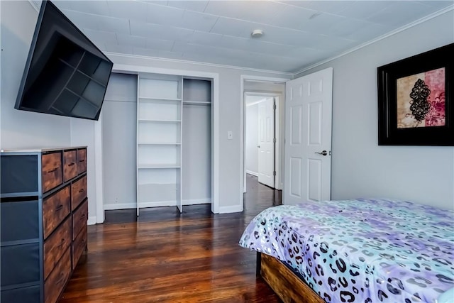 138 Cherry Rd, Rochester, NY 14612 - bedroom featuring dark wood-style floors, a closet, and ornamental molding