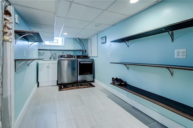 138 Cherry Rd, Rochester, NY 14612 - washroom featuring washer and dryer, recessed lighting, and cabinet space