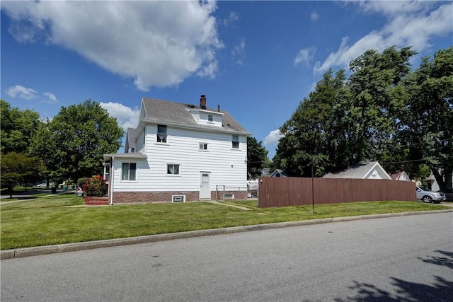 138 Cherry Rd, Rochester, NY 14612 - view of side of property with a chimney