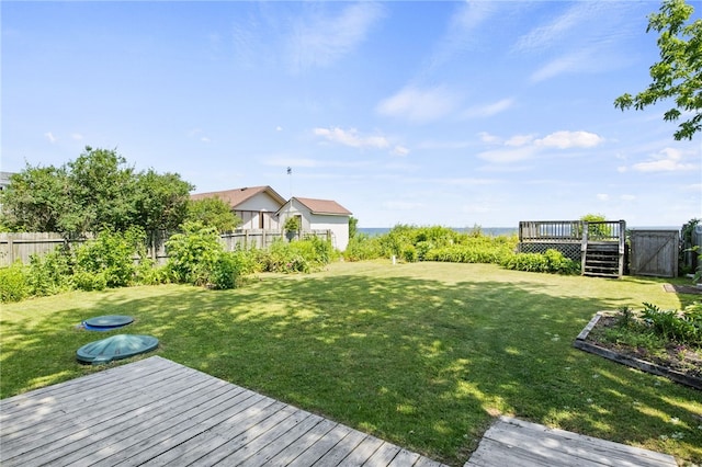 5808 W Wautoma Beach Rd, Hamlin, NY 14468 - fenced backyard with a wooden deck