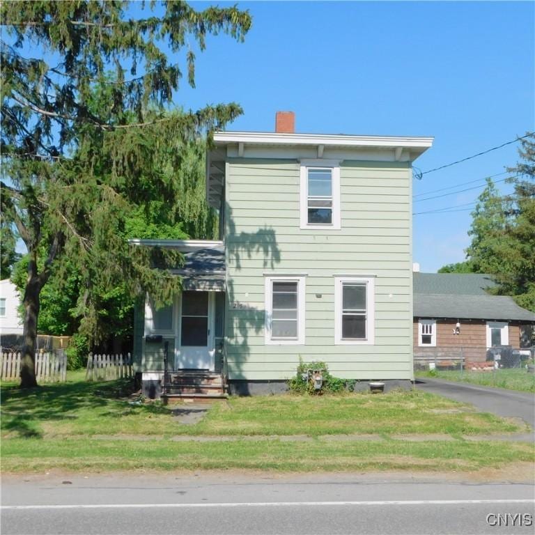 205 Hartwell Ave, Dewitt, NY 13057 - view of front of house with a chimney