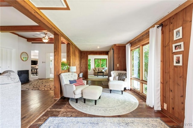 1848 Otisco Valley Rd, Otisco, NY 13110 - sitting room with wooden walls, wood-type flooring, and a ceiling fan