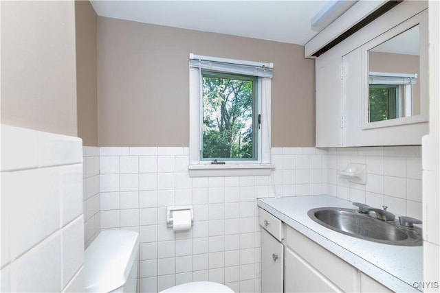 1848 Otisco Valley Rd, Otisco, NY 13110 - half bath with tile walls, vanity, and wainscoting