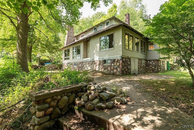 1848 Otisco Valley Rd, Otisco, NY 13110 - back of property featuring a chimney