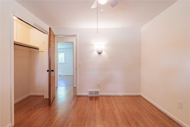 164 Queens Ln, Irondequoit, NY 14617 - unfurnished dining area featuring light wood finished floors and a ceiling fan