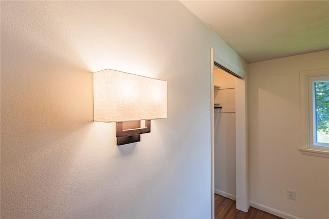 164 Queens Ln, Irondequoit, NY 14617 - hallway featuring dark wood-style flooring and baseboards