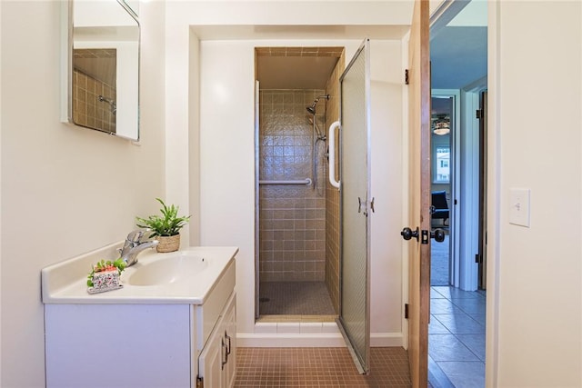 164 Queens Ln, Irondequoit, NY 14617 - full bathroom with a stall shower, vanity, and tile patterned floors