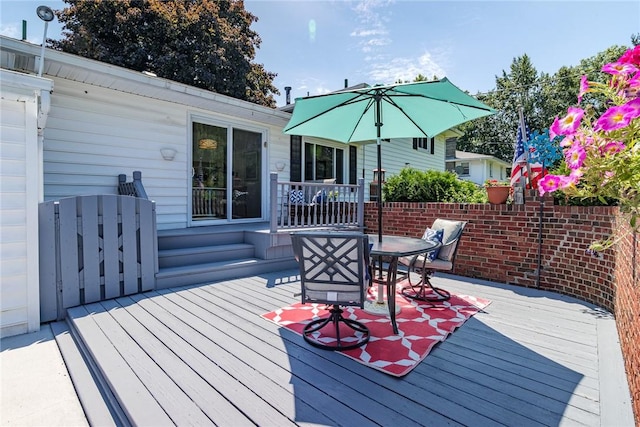 164 Queens Ln, Irondequoit, NY 14617 - wooden deck featuring outdoor dining area