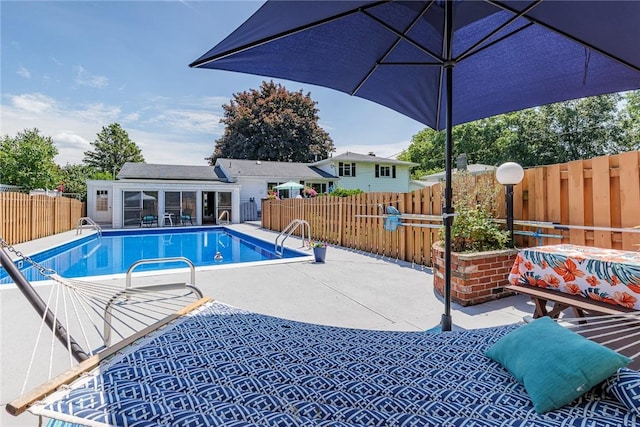 164 Queens Ln, Irondequoit, NY 14617 - view of swimming pool featuring a storage structure, an outbuilding, a fenced backyard, and a patio area