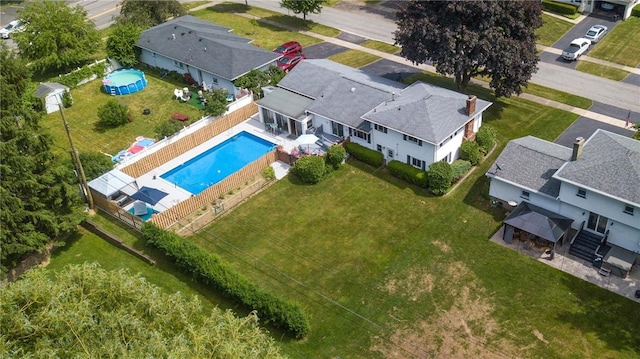 164 Queens Ln, Irondequoit, NY 14617 - aerial perspective of suburban area with a pool area