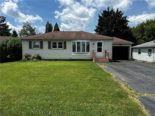 171 Vinal Ave, Irondequoit, NY 14609 - single story home with asphalt driveway, a garage, an outdoor structure, a front yard, and entry steps