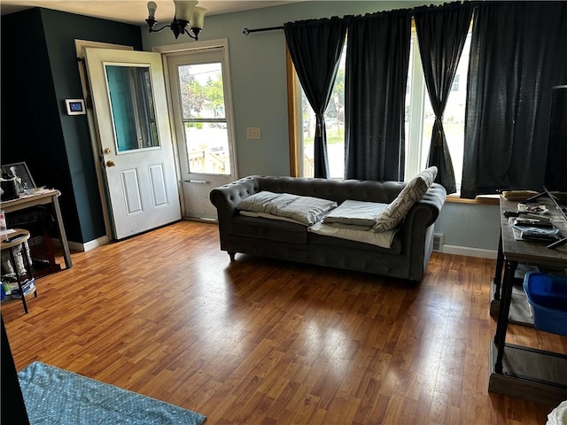 171 Vinal Ave, Irondequoit, NY 14609 - living area with wood finished floors and a chandelier