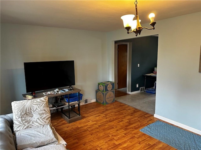 171 Vinal Ave, Irondequoit, NY 14609 - living room with a chandelier and wood finished floors