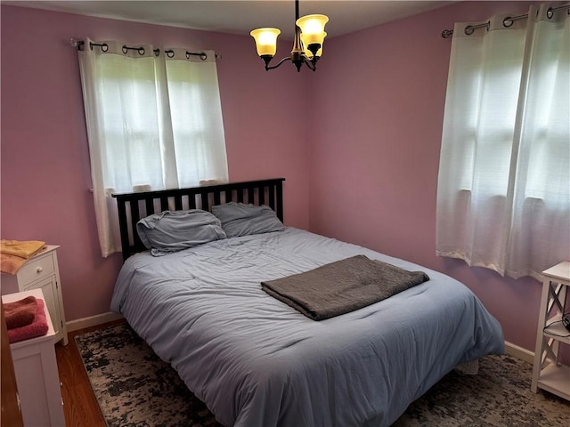 171 Vinal Ave, Irondequoit, NY 14609 - bedroom with a chandelier and wood finished floors