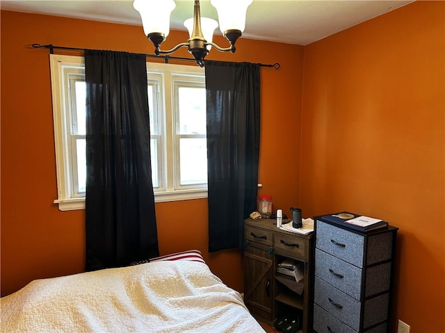 171 Vinal Ave, Irondequoit, NY 14609 - bedroom featuring a chandelier