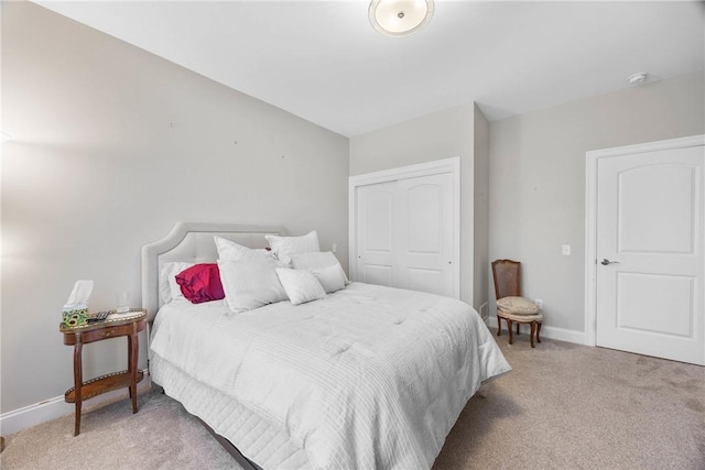 905 Pathway Ln, Webster, NY 14580 - bedroom featuring light carpet and a closet