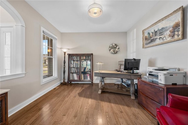 905 Pathway Ln, Webster, NY 14580 - office area with wood finished floors and arched walkways