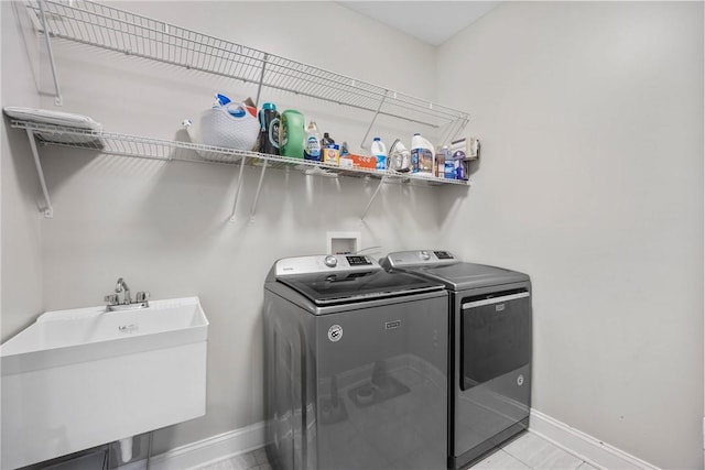 905 Pathway Ln, Webster, NY 14580 - laundry area with independent washer and dryer and light tile patterned floors