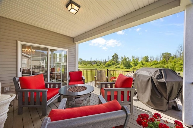905 Pathway Ln, Webster, NY 14580 - wooden terrace featuring an outdoor living space with a fire pit and area for grilling