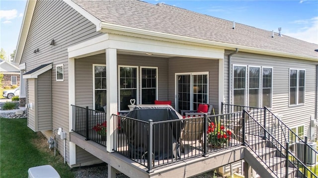 905 Pathway Ln, Webster, NY 14580 - rear view of property featuring roof with shingles and stairway