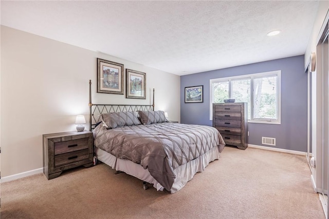 321 Penhurst Rd, Brighton, NY 14610 - bedroom with light colored carpet and a textured ceiling