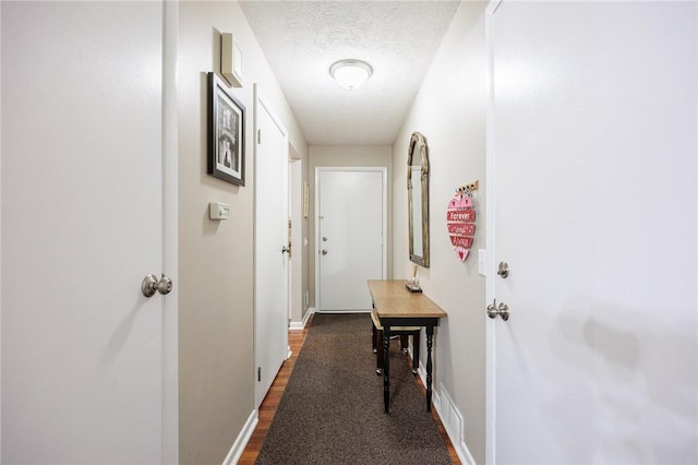 321 Penhurst Rd, Brighton, NY 14610 - hallway with baseboards and a textured ceiling