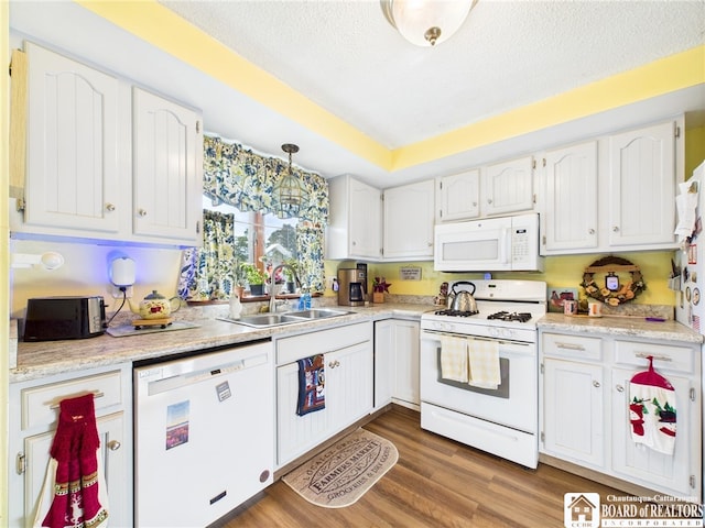407 N Clark St, Olean, NY 14760 - kitchen featuring white appliances, white cabinets, light countertops, and a textured ceiling