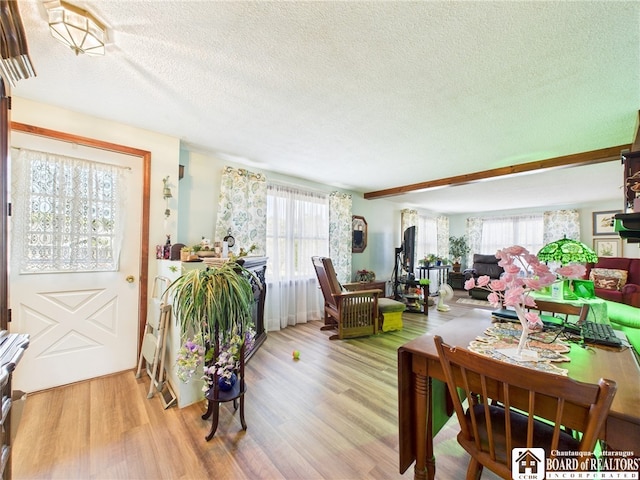407 N Clark St, Olean, NY 14760 - living room with a textured ceiling and wood finished floors