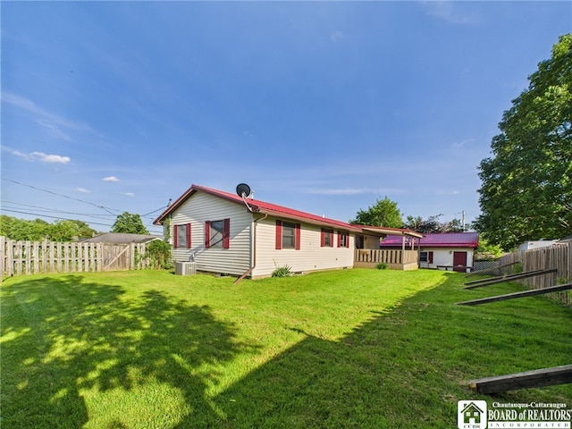 407 N Clark St, Olean, NY 14760 - back of property featuring a fenced backyard