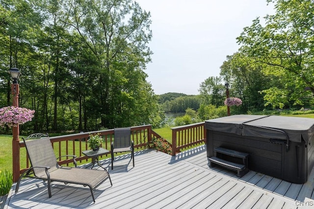 20 Hickory Grove Rd, Spur, Minetto, NY 13069 - wooden deck featuring a hot tub and a forest view