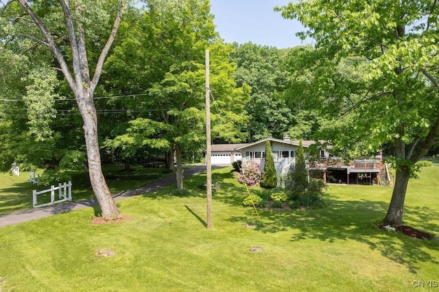 20 Hickory Grove Rd, Spur, Minetto, NY 13069 - view of yard featuring a deck, stairway, and a garage