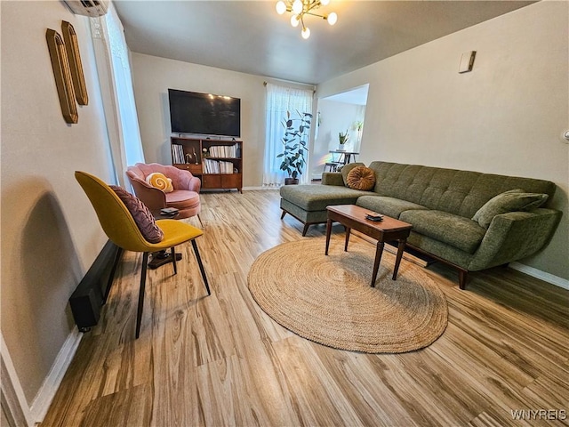 218 Edward St, North Tonawanda, NY 14120 - living area with light wood finished floors and an AC wall unit