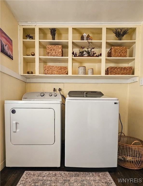 218 Edward St, North Tonawanda, NY 14120 - washroom featuring washing machine and dryer and dark wood-type flooring