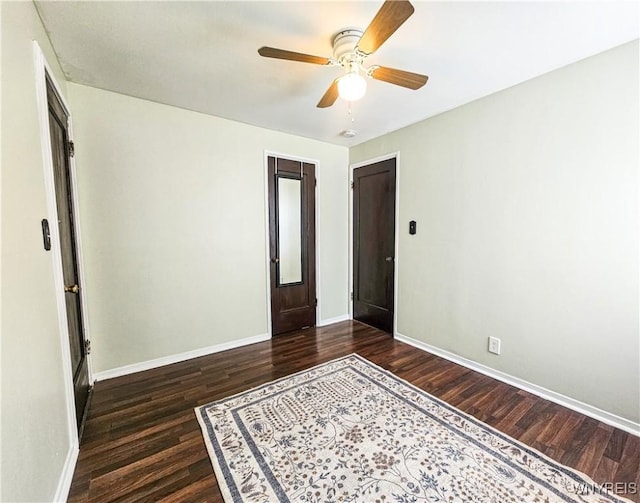 218 Edward St, North Tonawanda, NY 14120 - empty room with wood finished floors and a ceiling fan