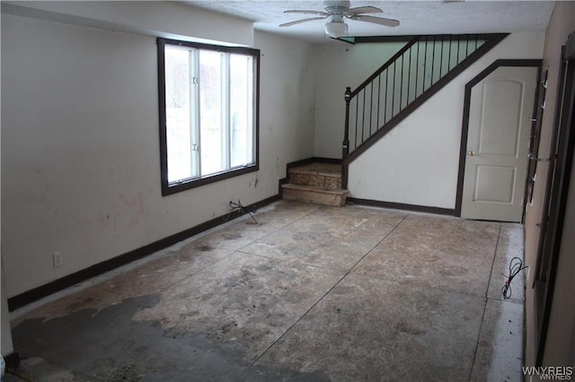 61 N Franklin St, New Albion, NY 14719 - unfurnished living room with stairs, a ceiling fan, and a textured ceiling
