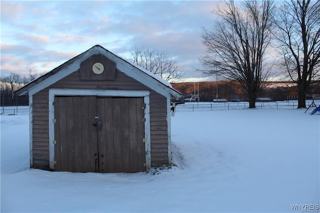61 N Franklin St, New Albion, NY 14719 - snow covered structure with a shed