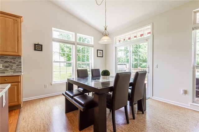 801 Surrey Hill Way, Henrietta, NY 14623 - dining area featuring plenty of natural light, light wood finished floors, and vaulted ceiling