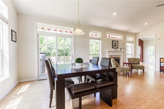 801 Surrey Hill Way, Henrietta, NY 14623 - dining area featuring a glass covered fireplace and recessed lighting