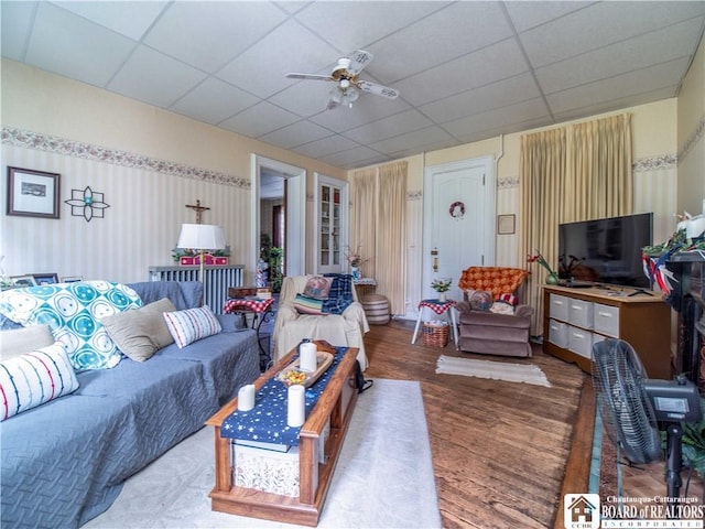 12 Central Ave, Portland, NY 14716 - living room featuring wood finished floors, a drop ceiling, and a ceiling fan
